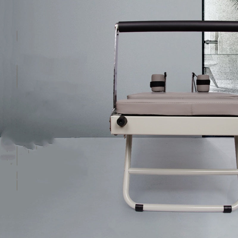 Close up reformer pilates bed with bar